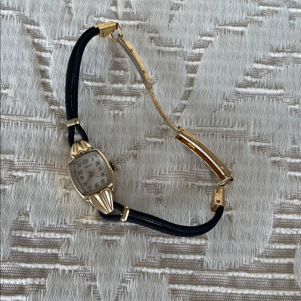 Elegant Gold and Black Women's Watch